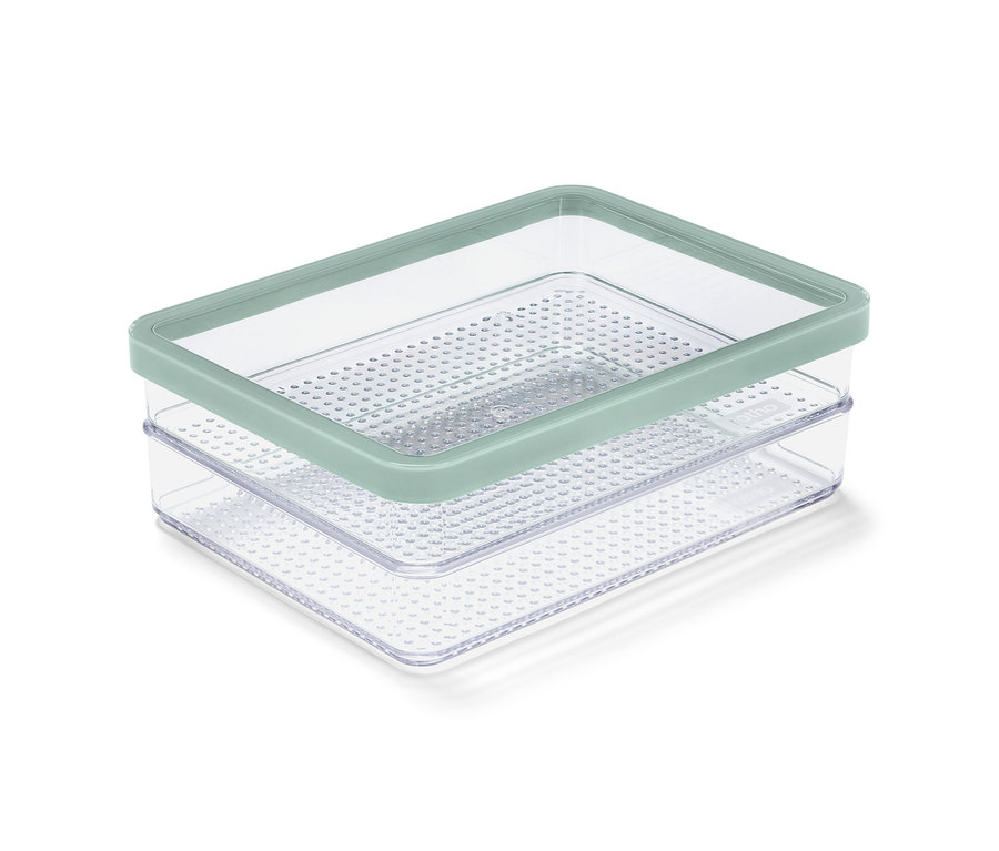 Eine durchsichtige Aufschnittbox mit einem hellgrünen Deckel.