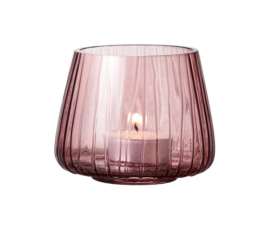 Rosafarbener Glas-Teelichthalter mit brennendem Teelicht darin. 2 Bitz Teelichthalter »Kusintha«.