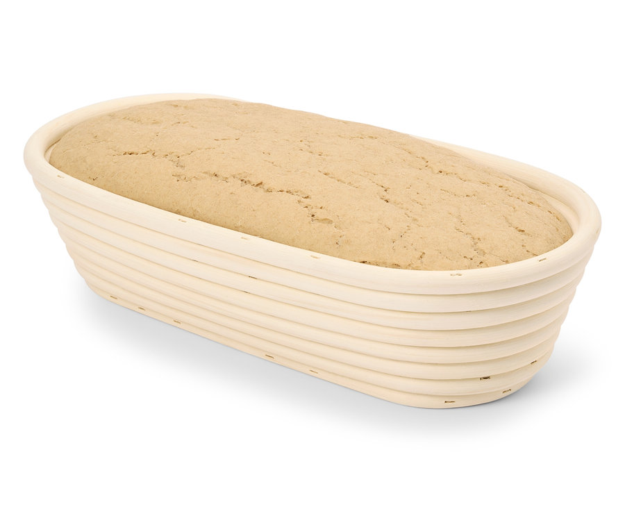Brotlaib in einem Peddigrohr-Gärkörbchen.