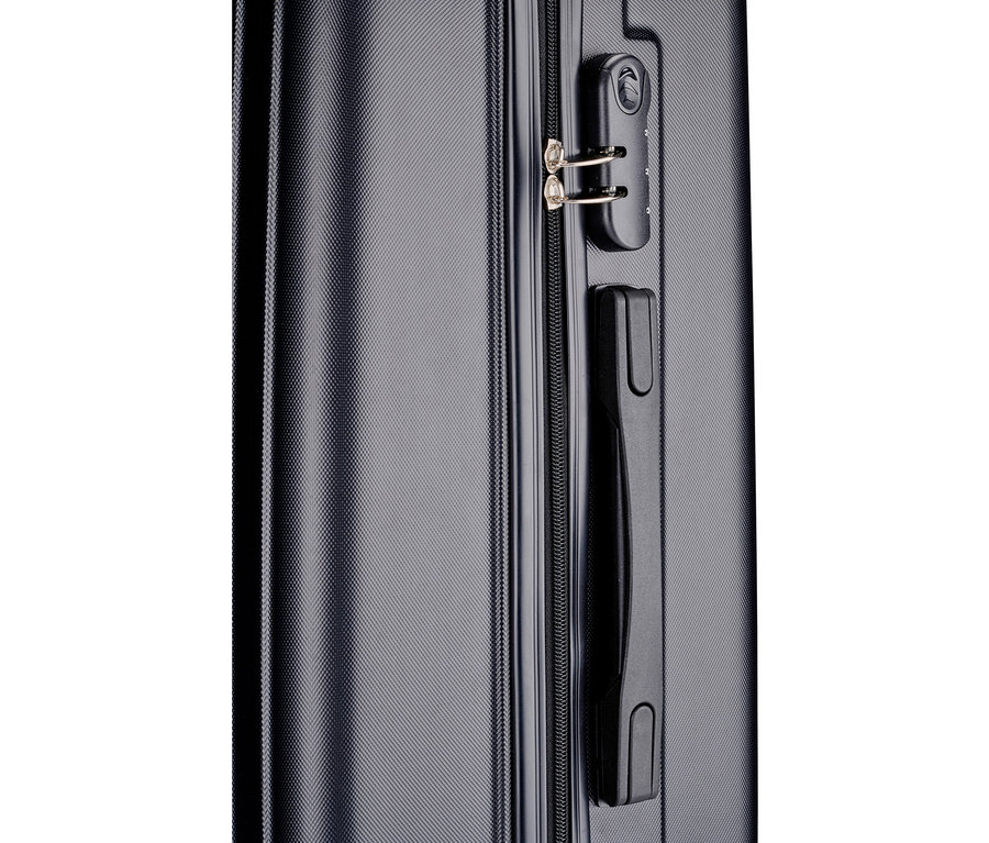 Nahaufnahme eines grauen Koffers mit Zahlenschloss und schwarzem Griff.