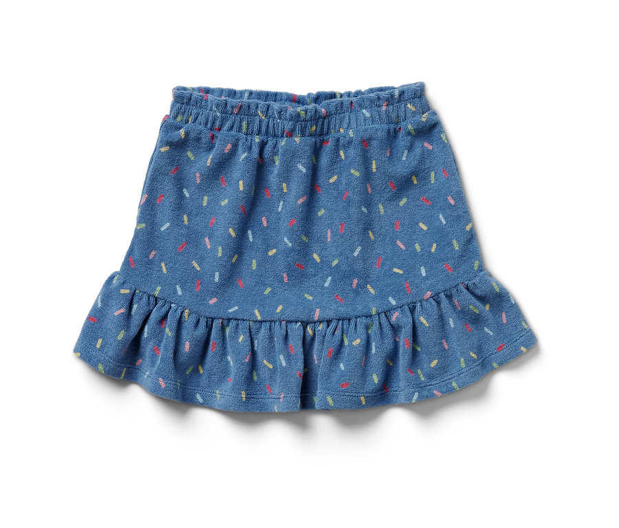Ein blauer Kinder-Frottier-Rock mit bunten Streuseln.