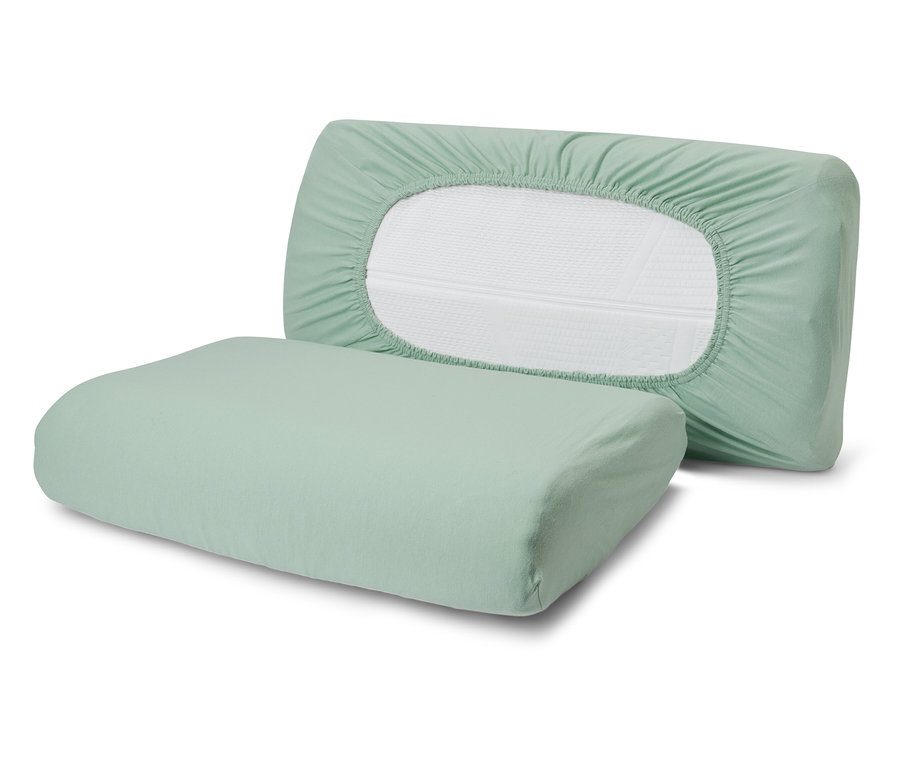 Zwei grüne Jersey-Nackenkissenbezüge.