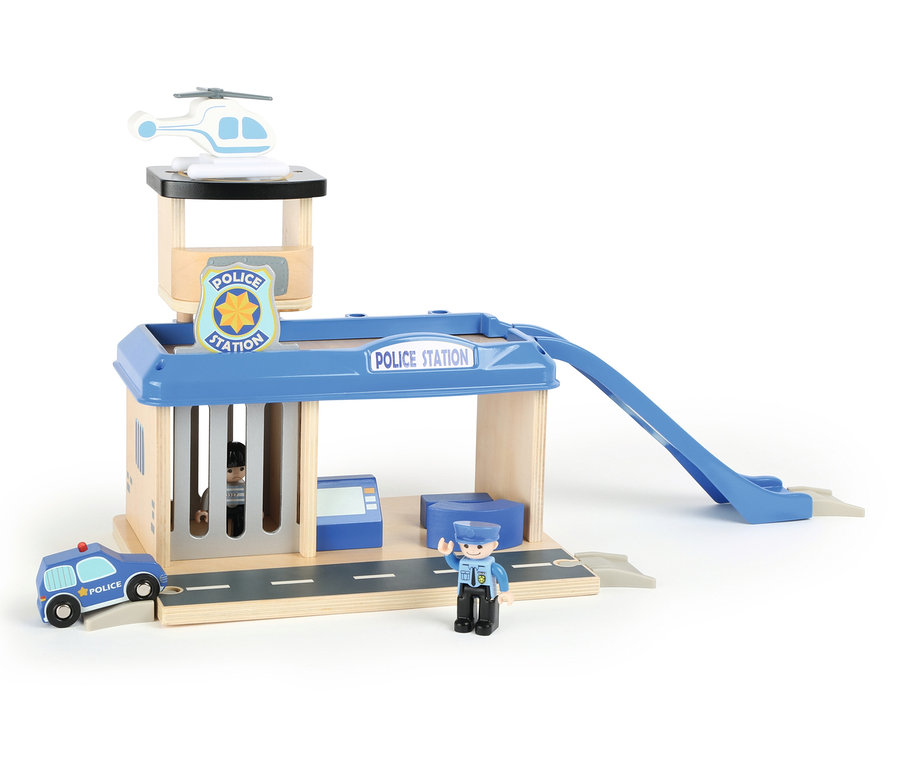 small foot Polizeiwache mit Zubehör. Eine Polizistenfigur steht vor dem Gebäude und winkt.