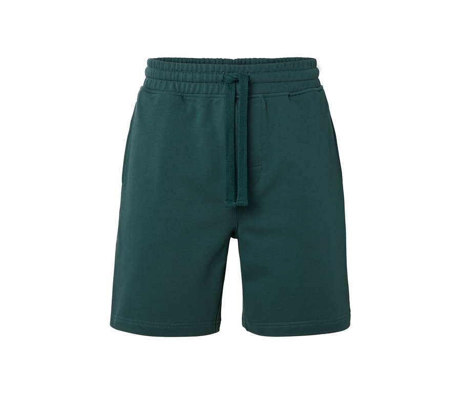 Eine grüne Sweatshorts mit Kordelzug am Bund.