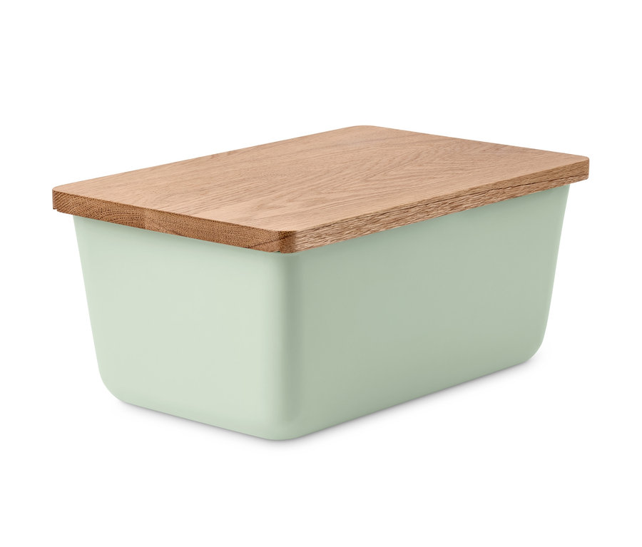 Ein grüner Brotkasten mit einem Schneidebrett aus Holz.
