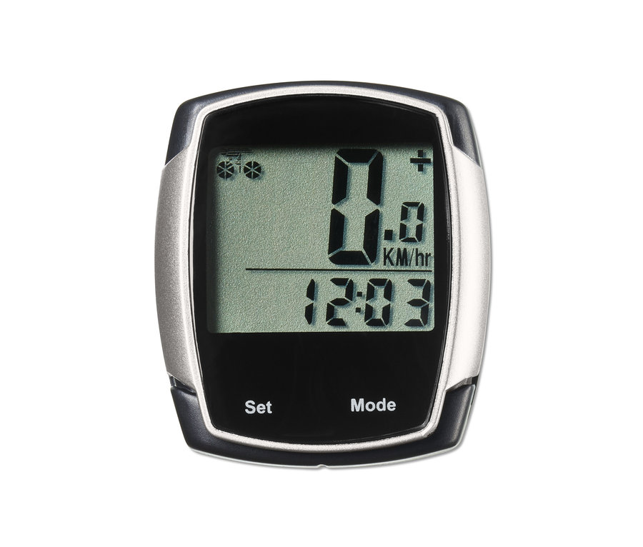 Nahaufnahme eines schwarzen und silbernen Fahrradcomputers, der 0,0 km/h und eine Zeit von 12:03 anzeigt.