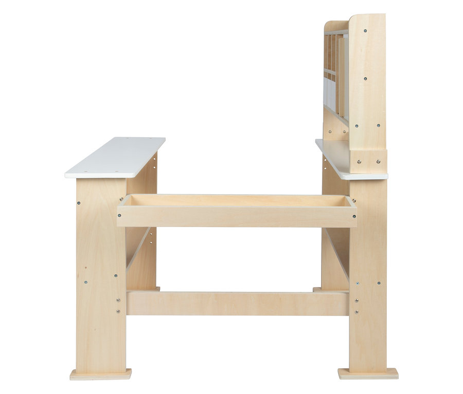 Seitenansicht eines hellen Holz-Kinderschreibtisches mit weißer Arbeitsfläche und Stauraum.