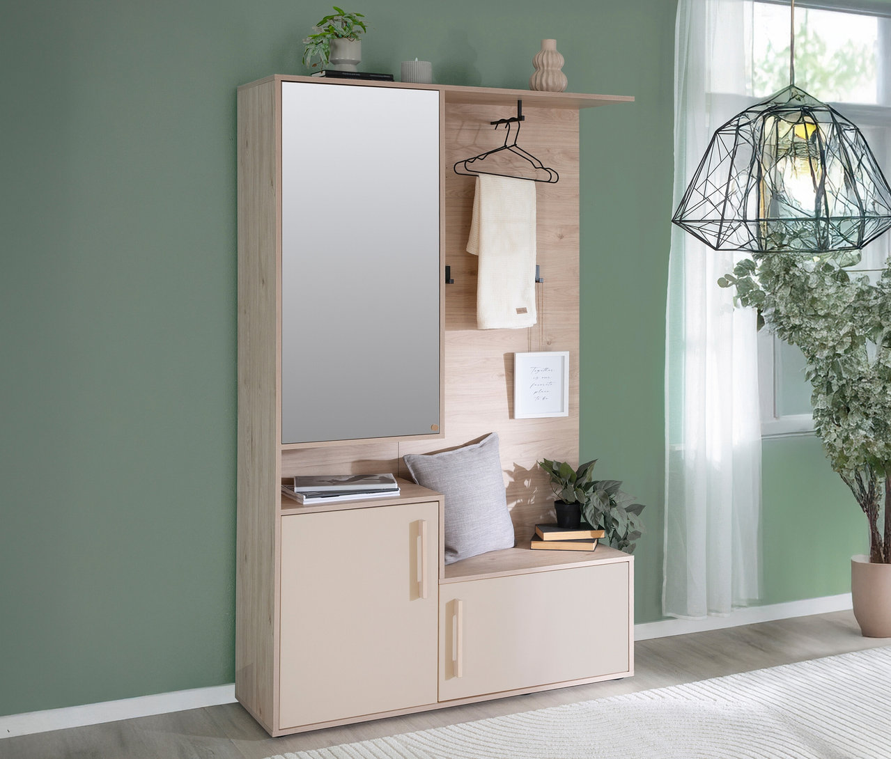 Eine weiße Roba Kompaktgarderobe »Entry« steht an einer grünen Wand.