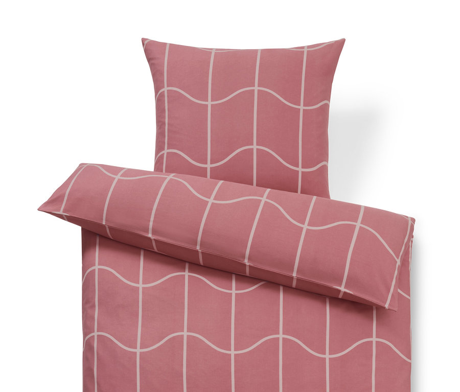 Rosa Biber-Bettwäsche mit weißem, wellenförmigem Karomuster.