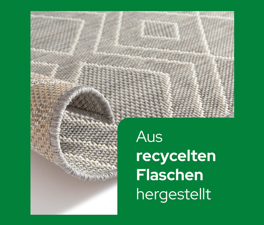 Detailaufnahme eines grauen, faltbaren Outdoor-Teppichs "Diamond Rhythm" mit geometrischem Muster.