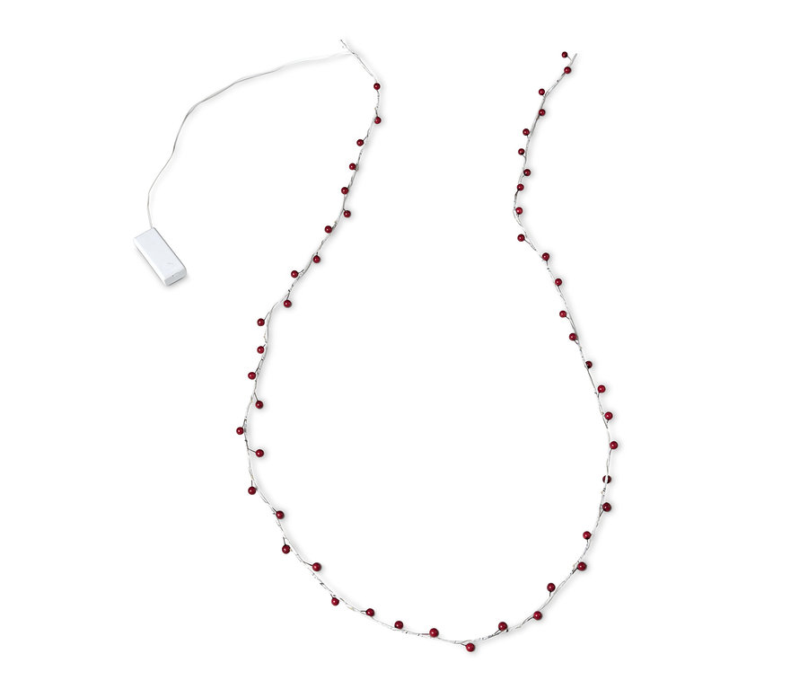 Ein LED-Leuchtzweig mit roten Beeren auf weißem Hintergrund.