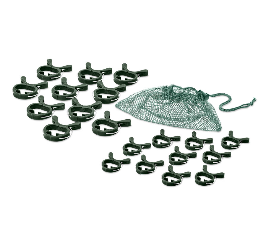 Ausgelegte grüne 20 Pflanzenclips und ein Netzbeutel mit Kordelzug.