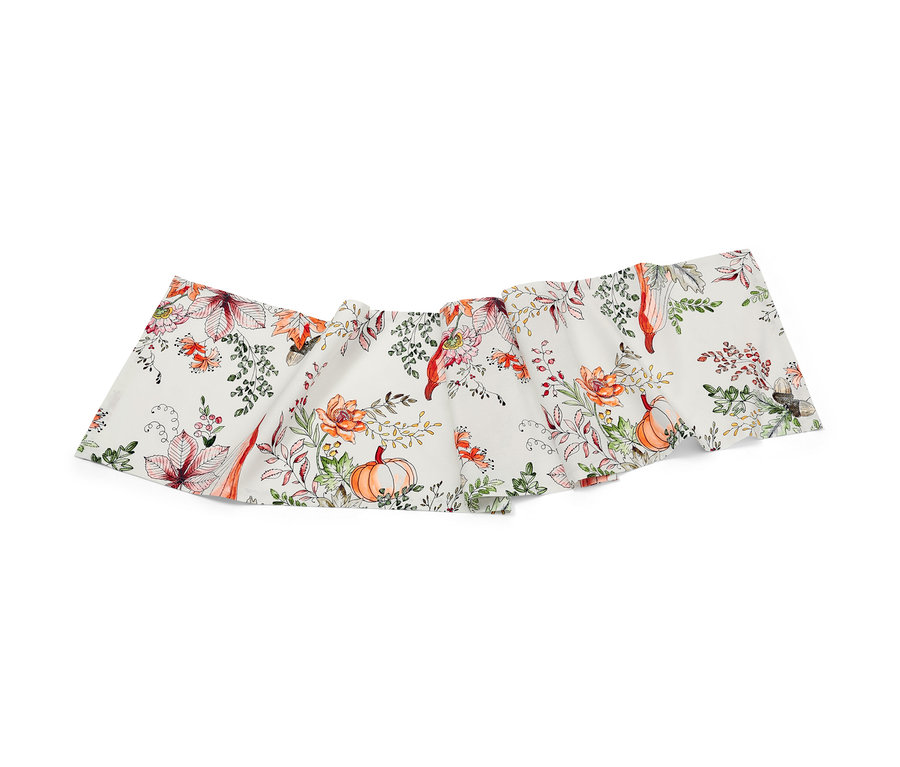 Tischläufer mit Herbstmotiv aus Kürbissen und Blättern.