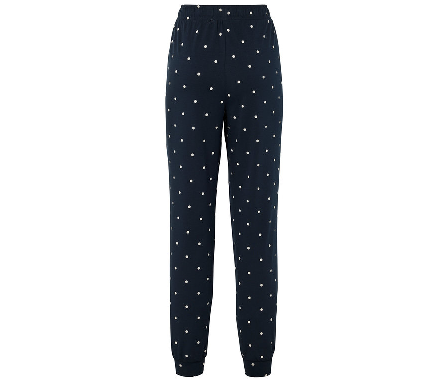 Dunkelblaue Jogginghose mit weißen Punkten.