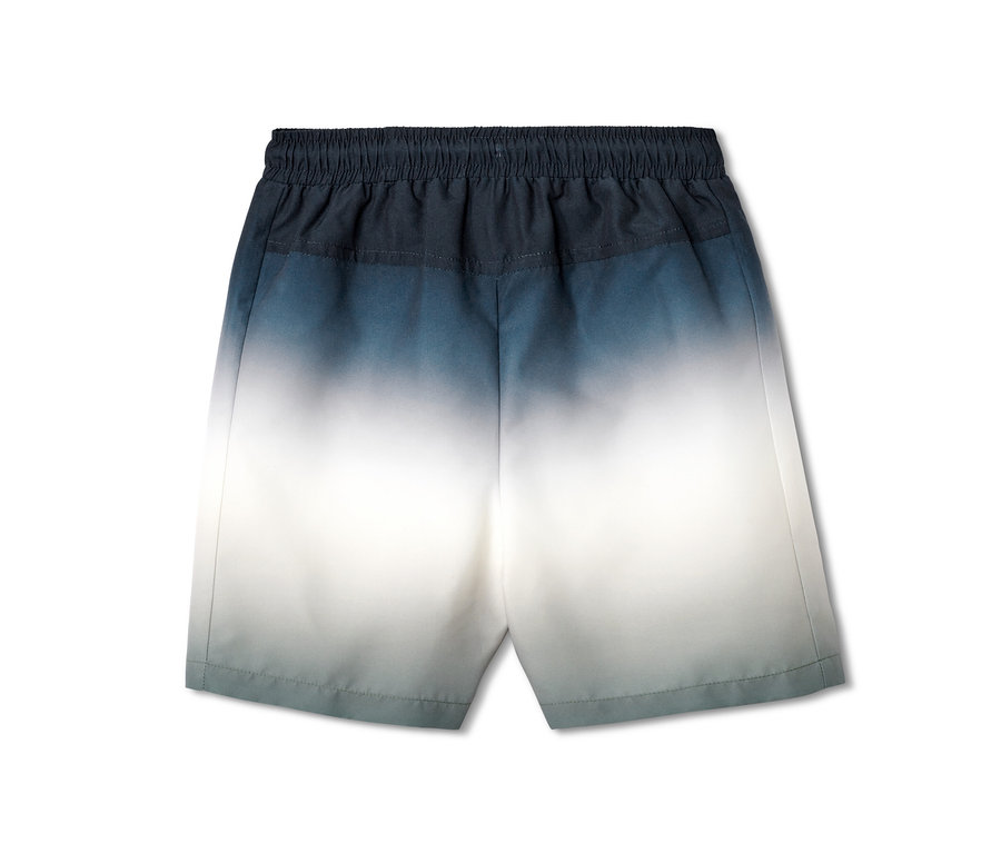 Detailansicht einer Kinder-Boardshorts mit blau-weißem Farbverlauf.