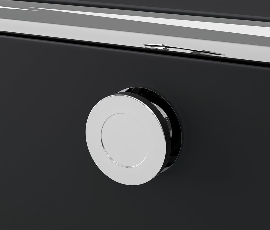 Detail eines schwarzen CN3 Metallmöbels mit einem runden silbernen Griff.