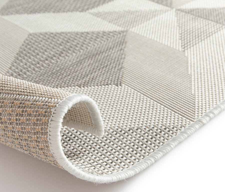 Detailansicht eines faltbaren Outdoor-Teppichs im Mosaik-Design.