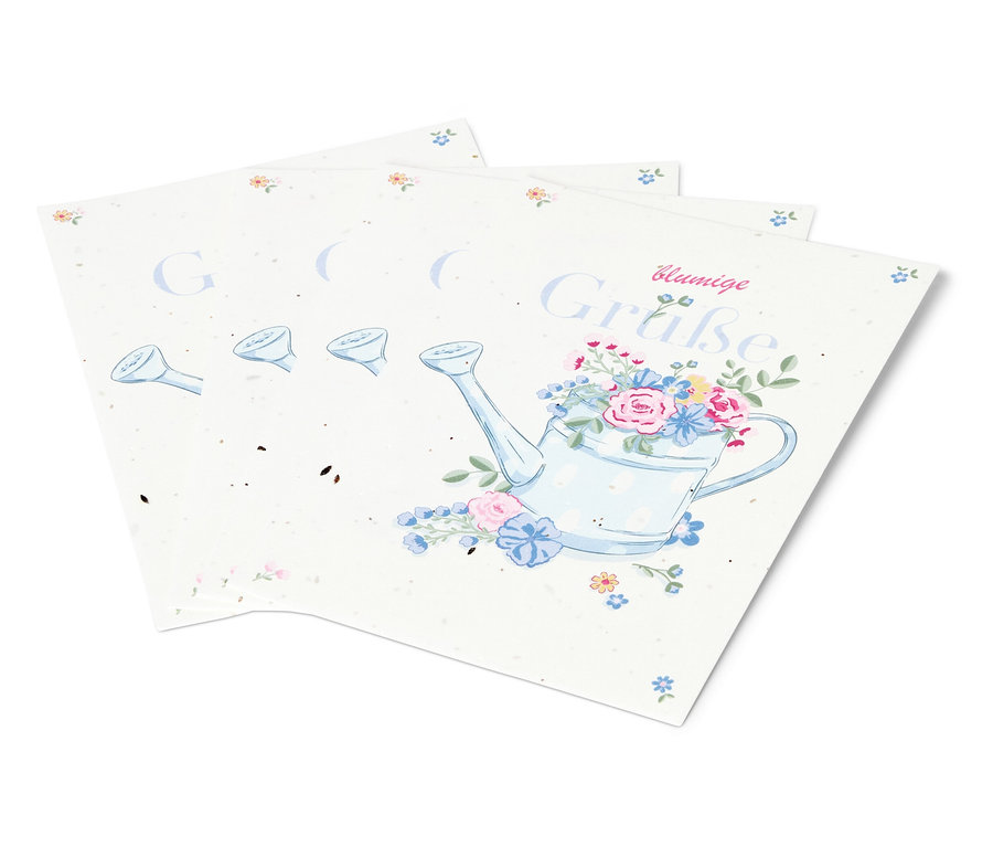 Drei Blätter Papier mit einer Zeichnung einer Gießkanne mit Blumen darauf.