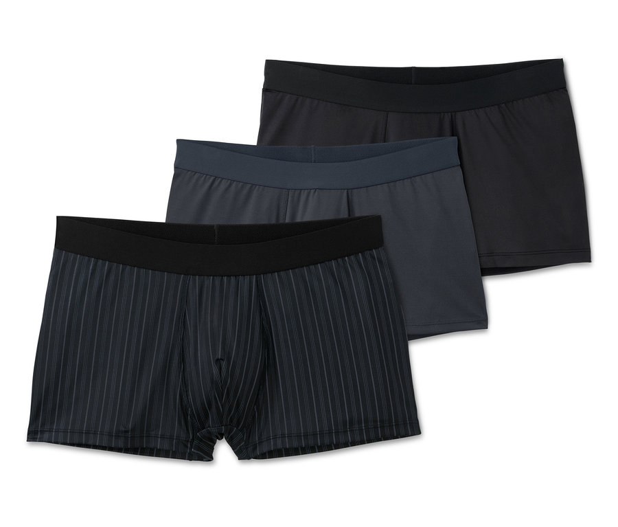 Drei Microfaser-Slipboxer in Schwarz, Grau und Blau.