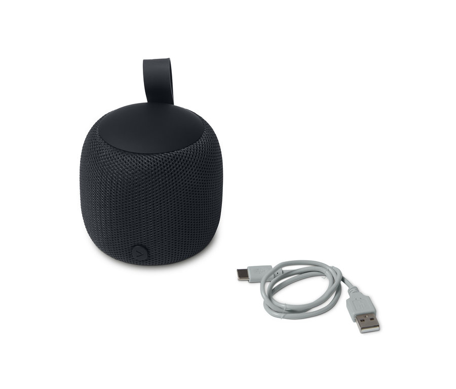 Ein anthrazitfarbener Design-Bluetooth®-Lautsprecher der Größe S mit grauem Ladekabel.