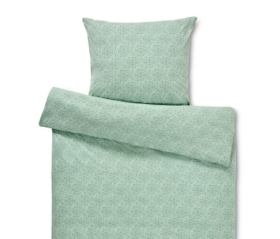 Grüne Jersey-Bettwäsche mit geometrischem Muster. Ein normalgroßer und ein übergroßer Bettbezug.