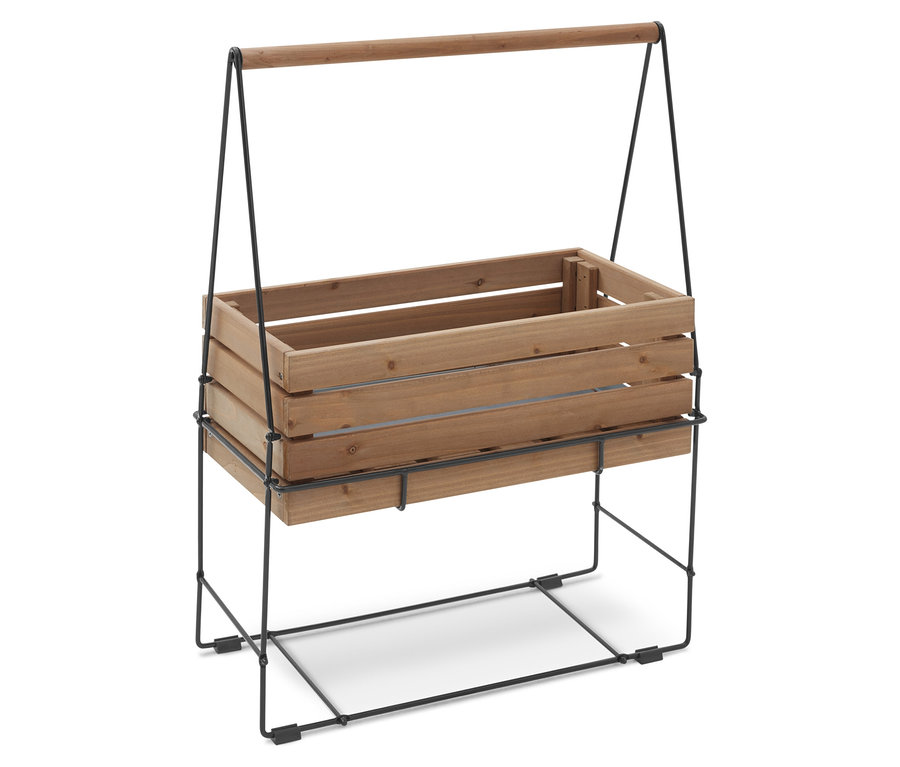 Holzkiste auf einem schwarzen Metallständer mit Holzgriff.