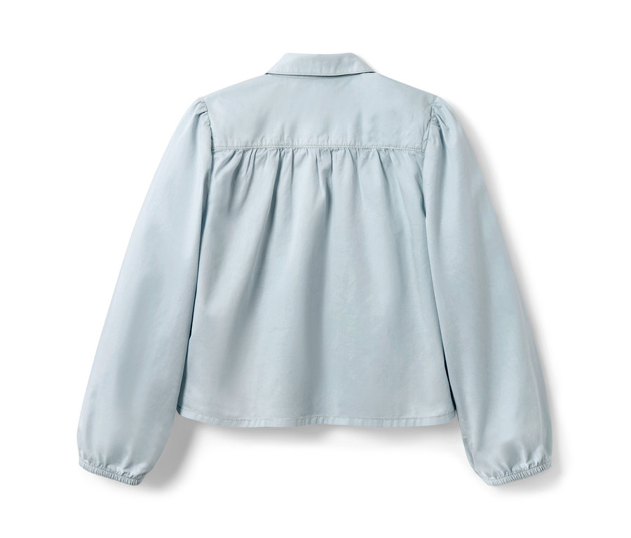 Hellblaue Kinder-Jeansbluse von hinten.
