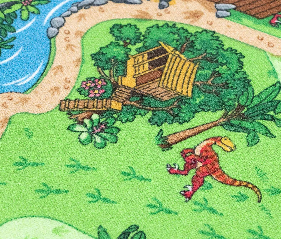 Detailansicht eines Kinderteppichs »DINO«, mit Dinosaurier-, Baumhaus- und Flussmotiven.