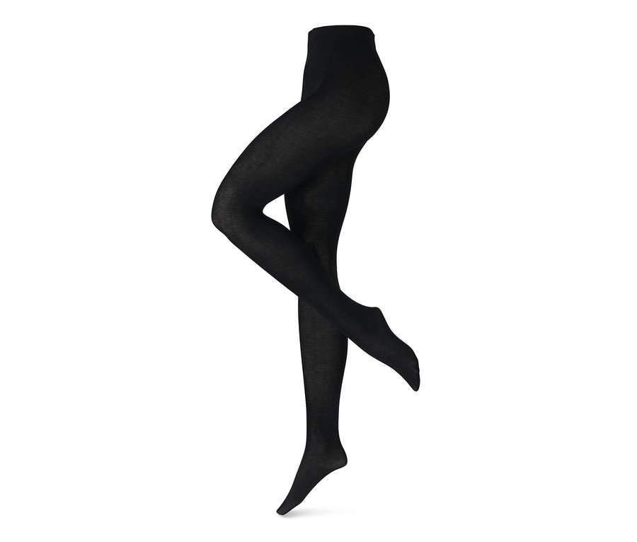 Beine in schwarzer Strick-Strumpfhose mit Viskose.
