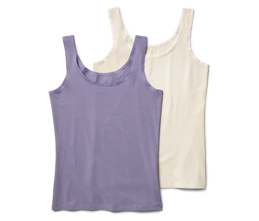 Zwei Tanktops liegen übereinander, eines in Lila und das andere in Creme.