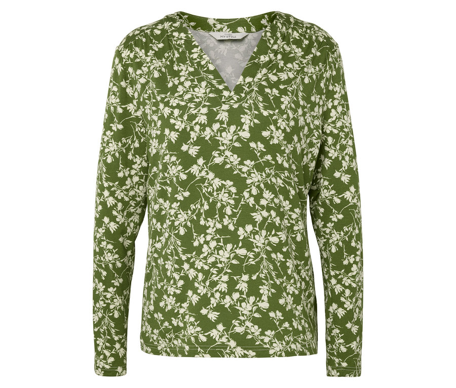 Grüne, langärmlige Bluse mit weißem Blumenmuster.