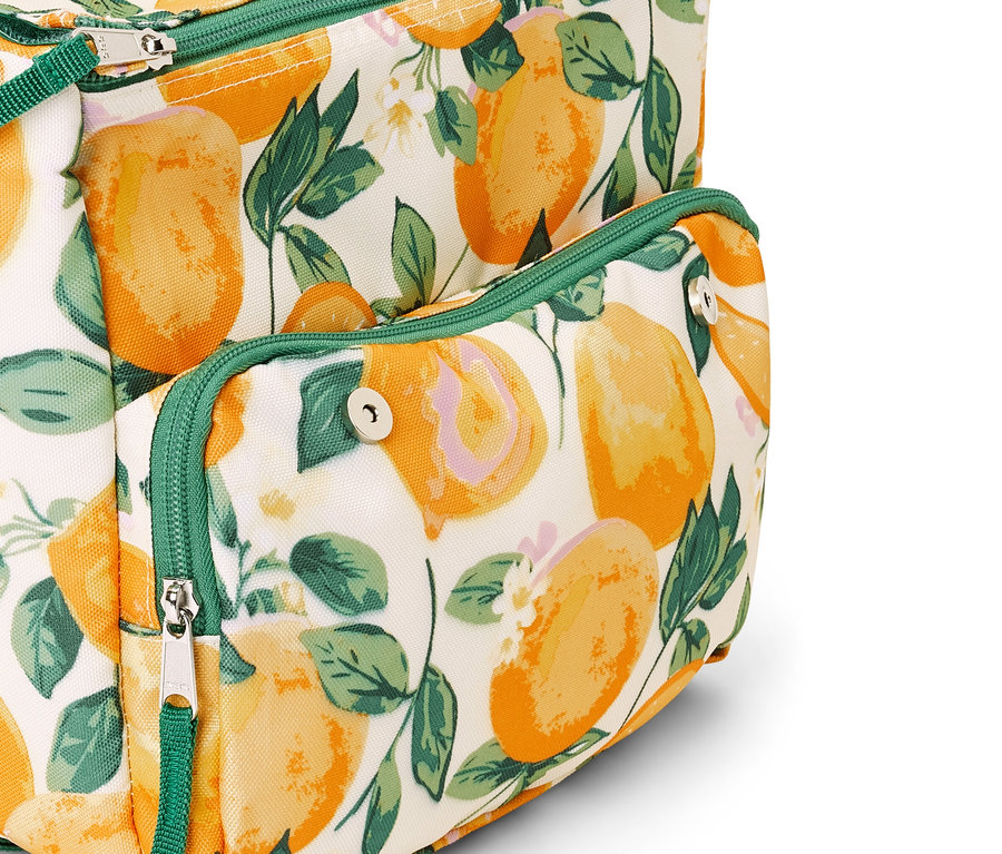 Detailaufnahme einer Mini-Kühltasche mit Zitrusdruck und grünen Akzenten.