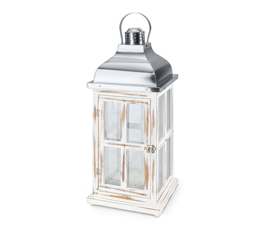 Eine große LED-Dekolaterne mit weißem Holzrahmen und silbernem Metalldach.