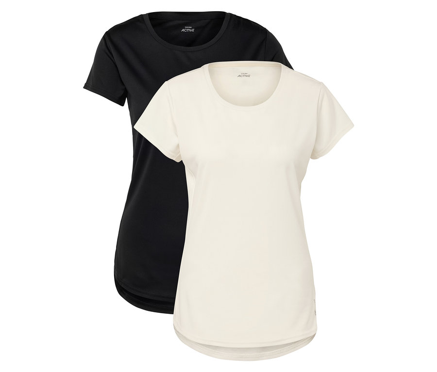 Zwei kurzärmelige T-Shirts, eines schwarz und eines cremefarben, liegen nebeneinander.