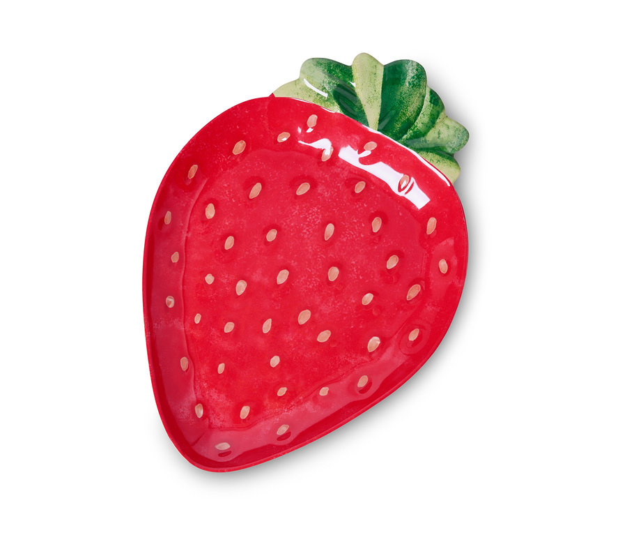 Ein roter Servierteller in Form einer Erdbeere mit weißen Punkten.
