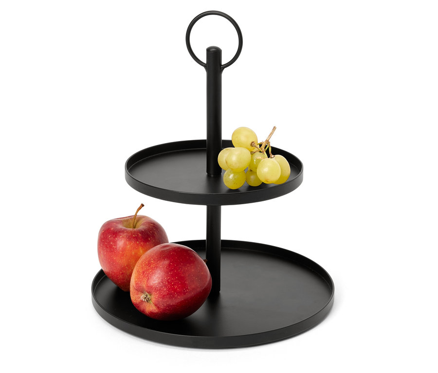Schwarze zweistöckige Etagere mit Äpfeln und Weintrauben.