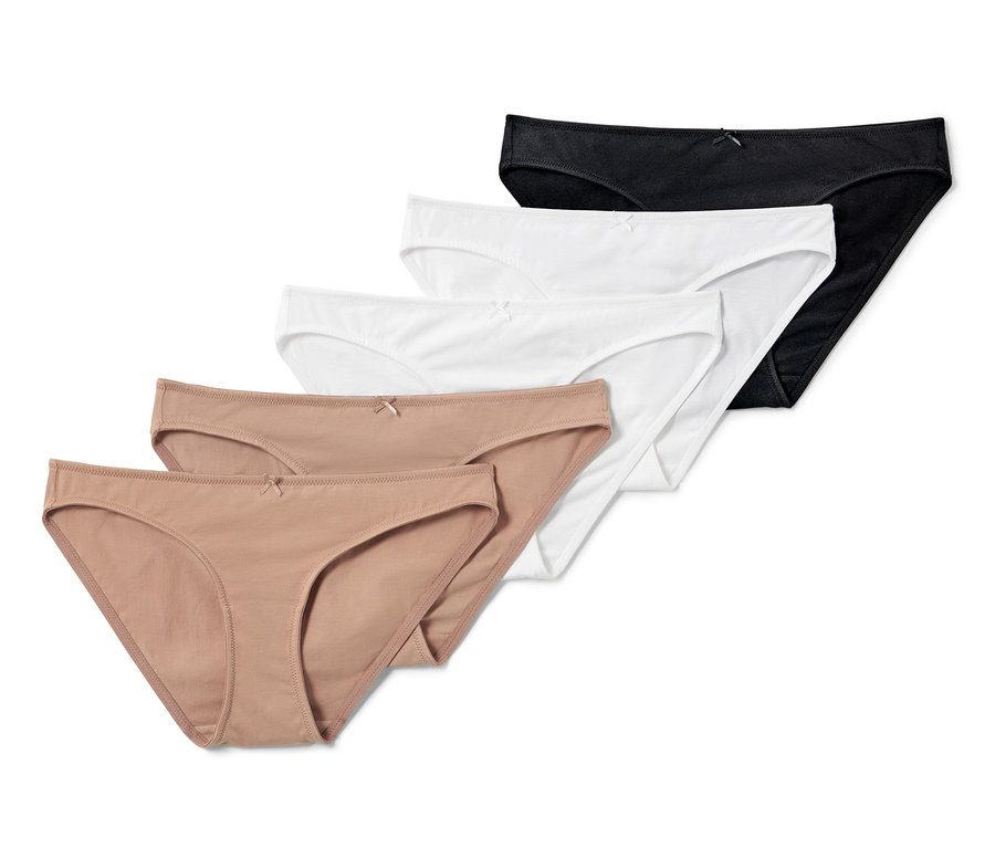 Fünf einfarbige Slips in den Farben Schwarz, Weiß und Beige.