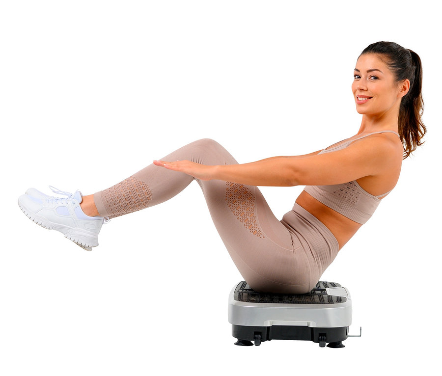 Frau macht Sit-ups auf dem Christopeit Vibrationstrainer »Vibro VBT 4200«.