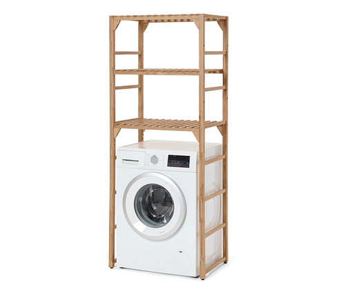 Ein weißer Wäschetrockner steht unter einem Massivholz-Waschmaschinenregal.