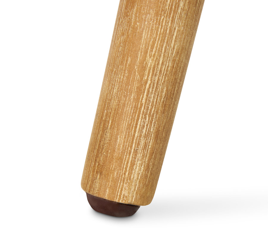 Detailaufnahme eines Stuhlbeins eines Schalenstuhls mit Textilgeflecht.