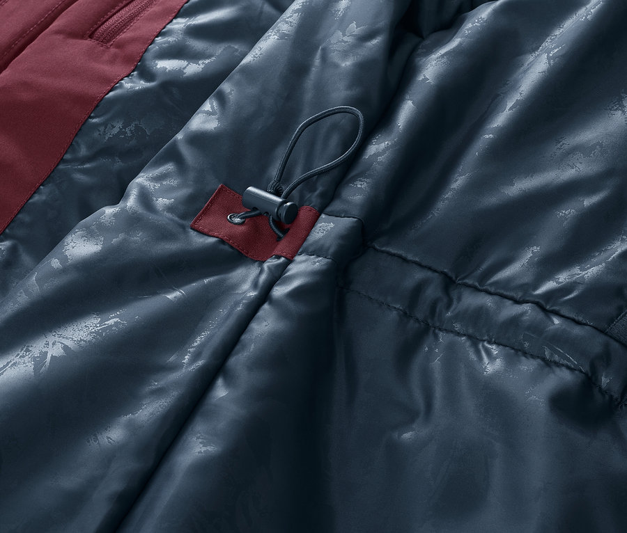 Detailansicht einer Ski-und-Snowboardjacke.