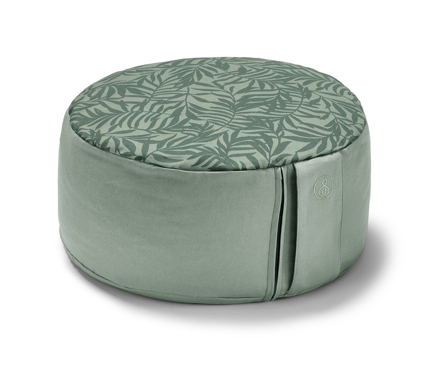 Ein grünes Meditationskissen.