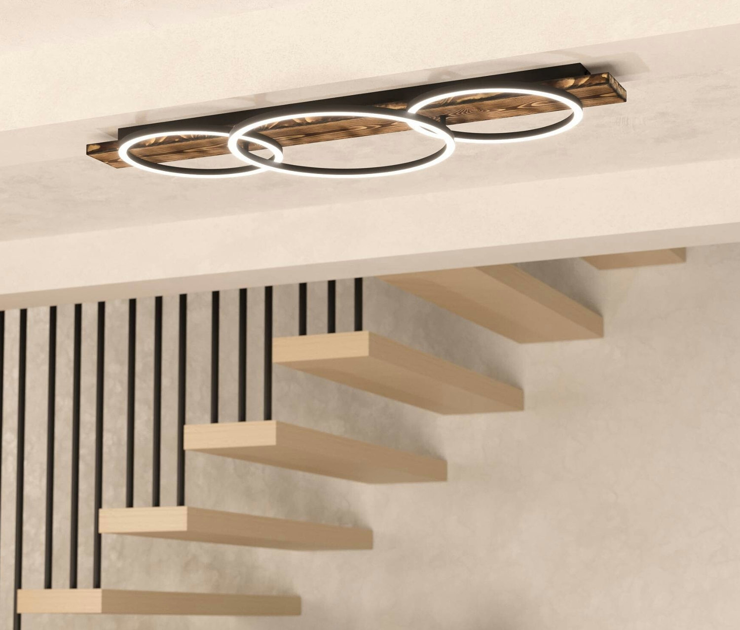 Eglo 3er-LED-Deckenleuchte »Boyal« an der Decke, darunter Treppe, Pflanze und Schrank.