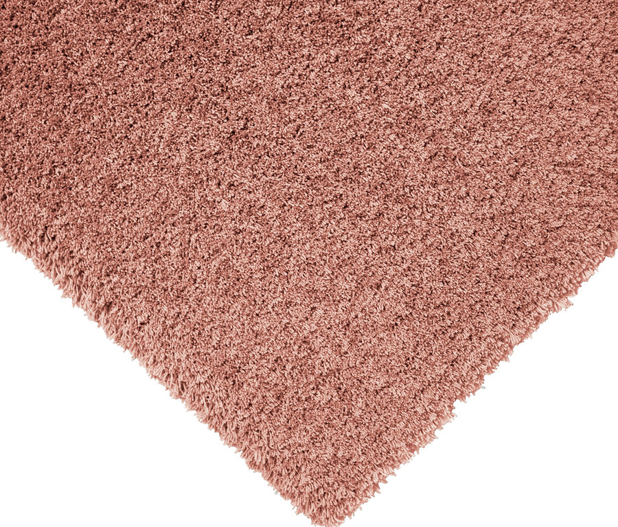 Detailansicht eines rostfarbenen Teppichs »Pleasure«.