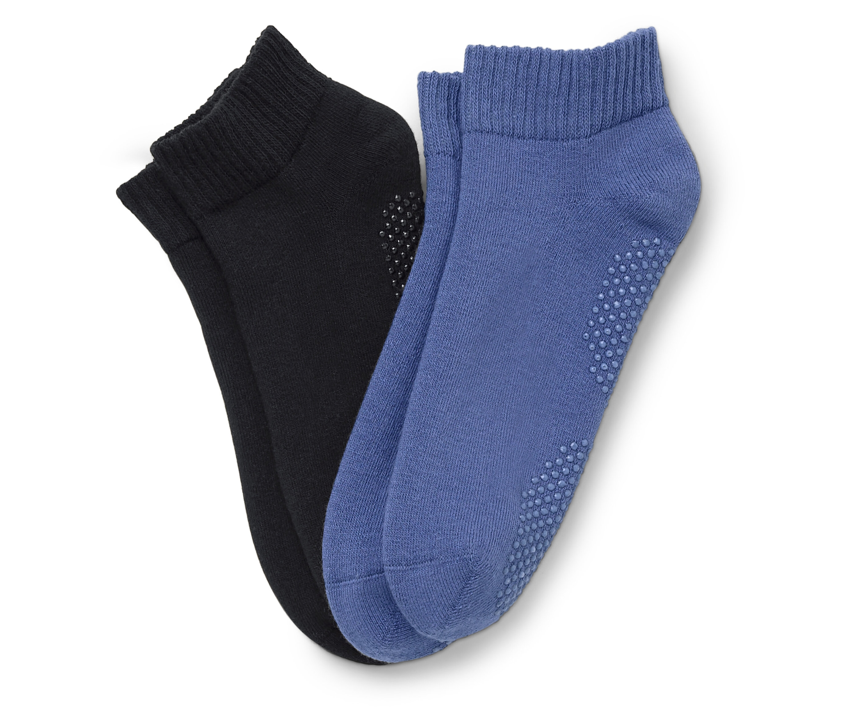 Ein Paar Socken, eine schwarz und eine blau, liegen nebeneinander.