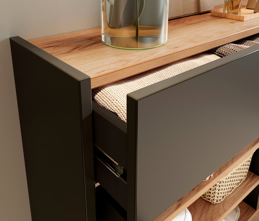 Detailansicht eines breiten Mehrzweckschranks "Ameca" in Graphit mit teilweise geöffneter Schublade.