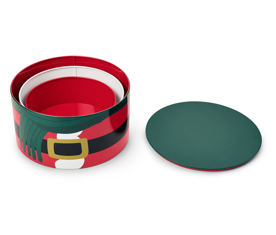 3 Keksdosen mit Weihnachtsmotiv stehen offen da.