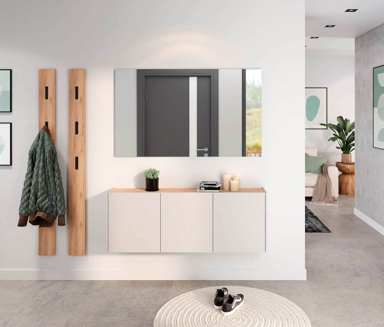 Flur mit Spiegel über einem weißen Schrank mit Holzplatte, Garderobenpaneel mit Jacke und rundem Teppich mit Schuhen.