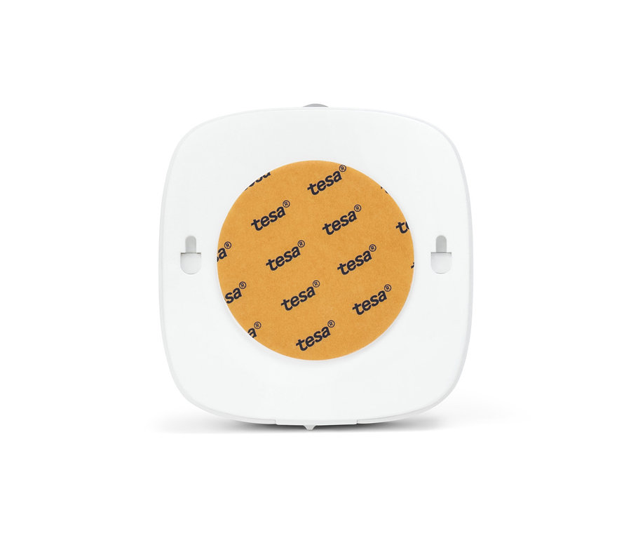 Detailaufnahme einer weißen 2 LED-Multifunktionsleuchte mit orangefarbener Klebefläche.