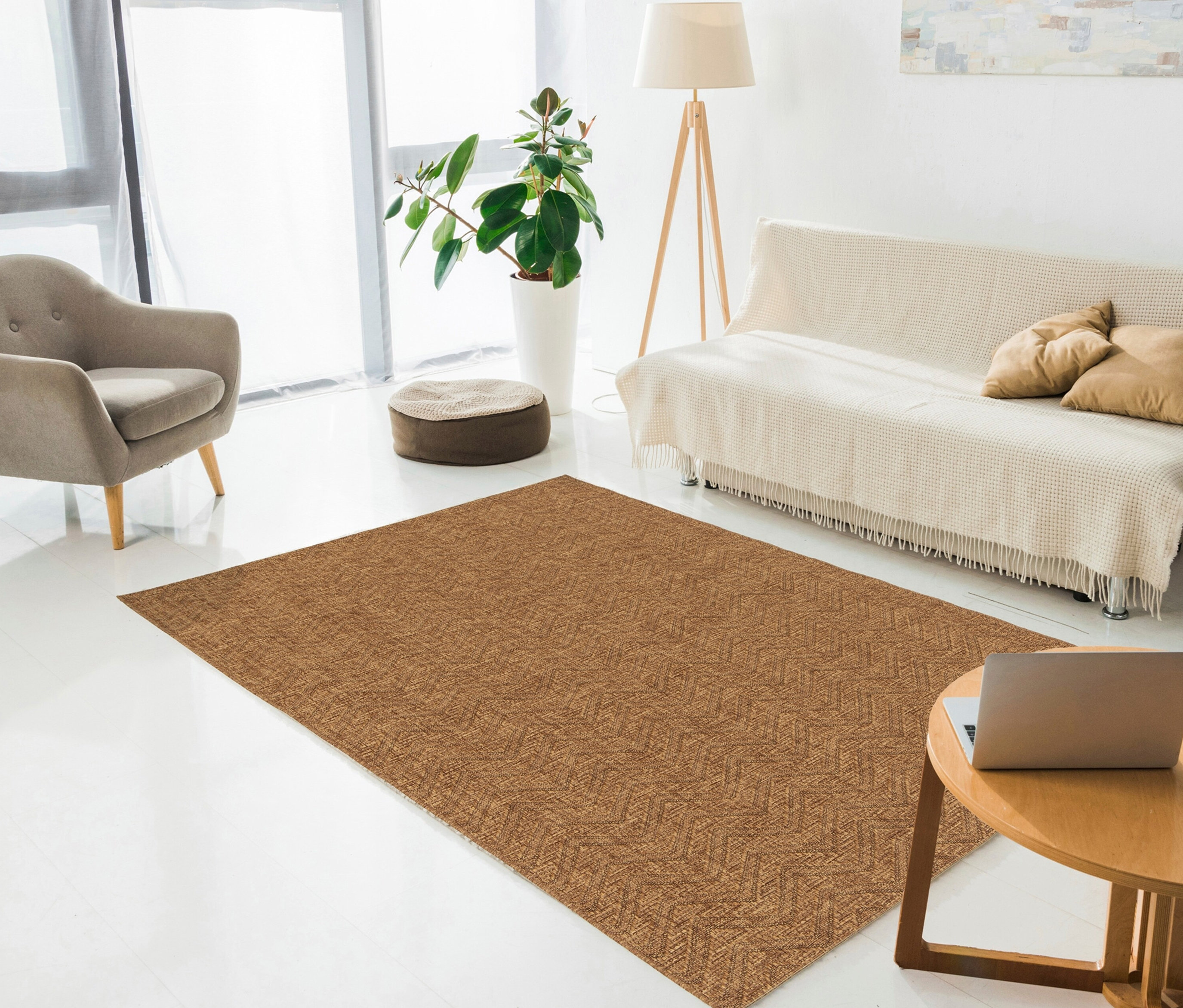Ein brauner Teppich »Roy«, Lines, ca. 120 x 170 cm liegt im Wohnzimmer.